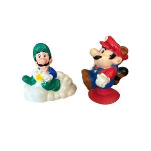 Vintage super Mario toys Luigi racer and Tanooki Mario